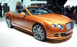 Orange Bentley Continental GT Speed on display