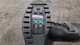 Rapha Explore gravel shoe sole showing the tread and cleat plate