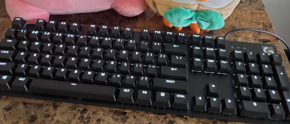 A Logitech G413 on a counter top