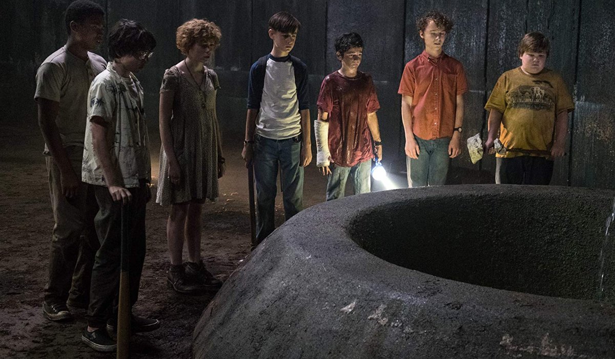 IT The Loser's Club looks into a huge sewer pipe