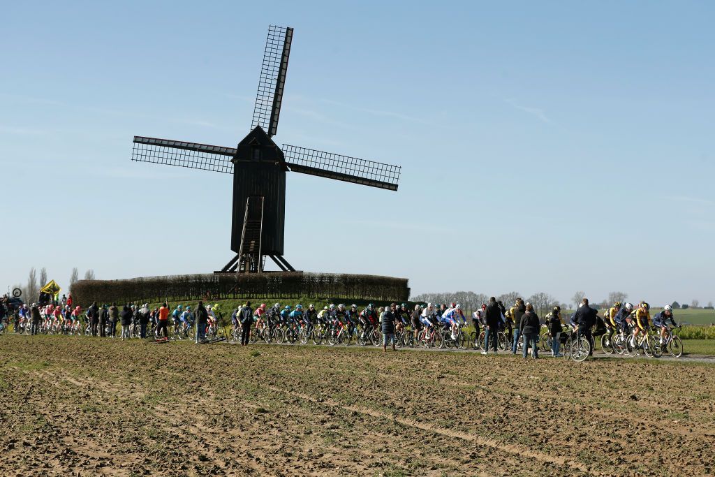 NINOVE BELGIUM FEBRUARY 26 A general view of the peloton competing during the 77th Omloop Het Nieuwsblad 2022 Mens Race a 2042km race from Ghent to Ninove OHN22 FlandersClassic WorldTour on February 26 2022 in Ninove Belgium Photo by Bas CzerwinskiGetty Images