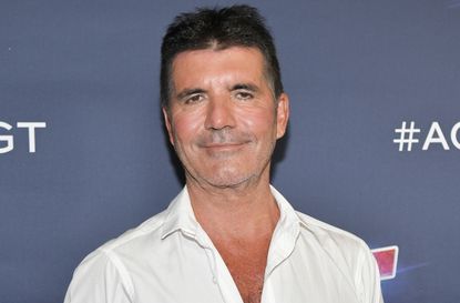 simon cowell breaks down tears x factor