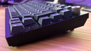 Corsair K65 Plus wireless from the side to show command dial and elevation