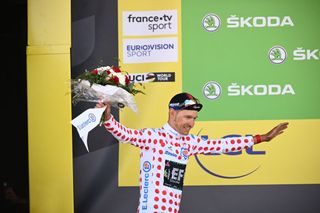 EF EducationEasypost teams Danish rider Magnus Cort Nielsen celebrates with the climbers dotted jersey on the podium after the 2nd stage of the 109th edition of the Tour de France cycling race 2022 km between Roskilde and Nyborg in Denmark on July 2 2022 Photo by Marco BERTORELLO AFP Photo by MARCO BERTORELLOAFP via Getty Images