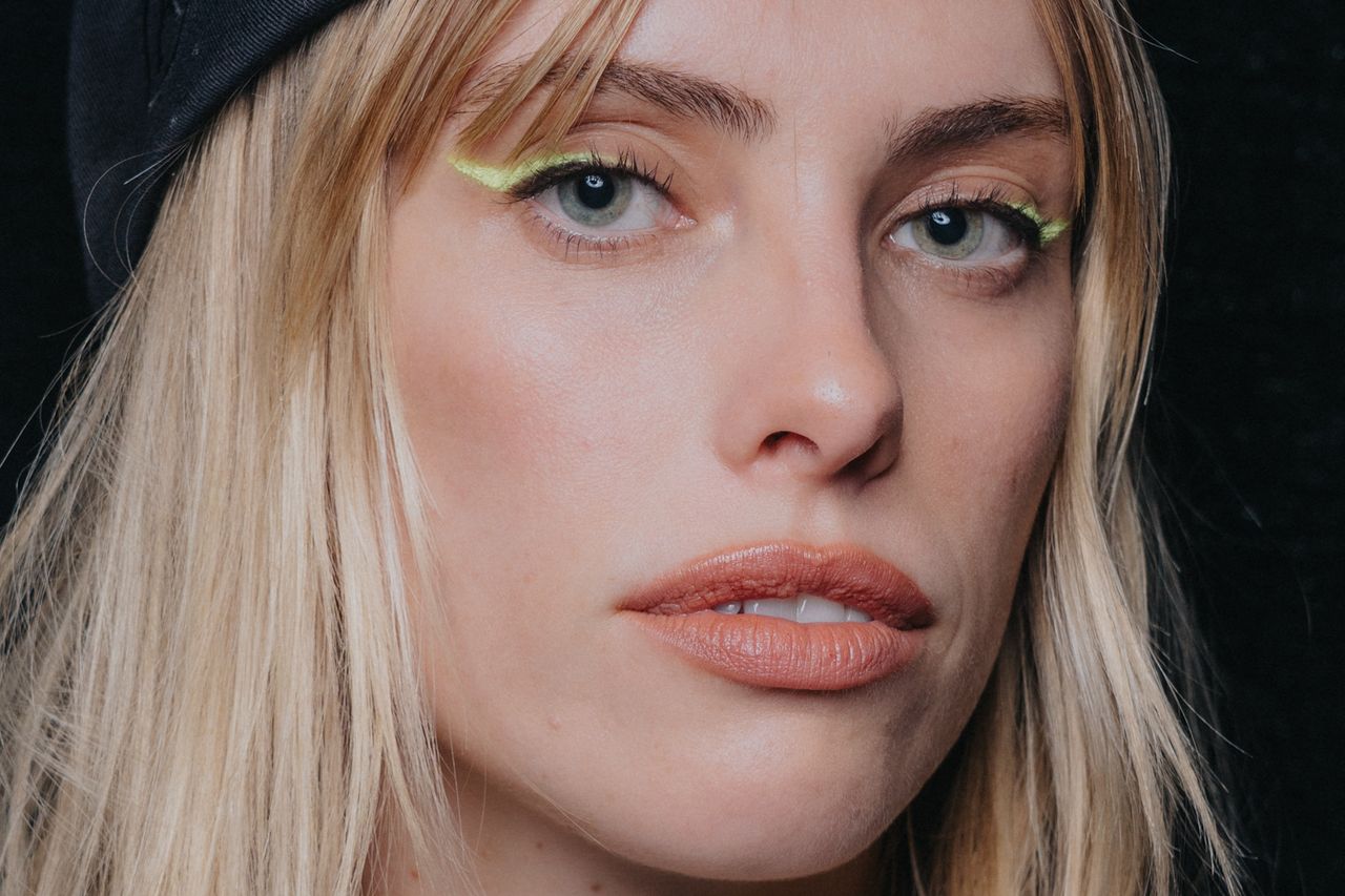 A funky yellow wing at Rynshu on a blonde model.