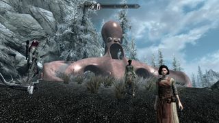 Three modded companions stand in front of a large plastic octopus in Skyrim.