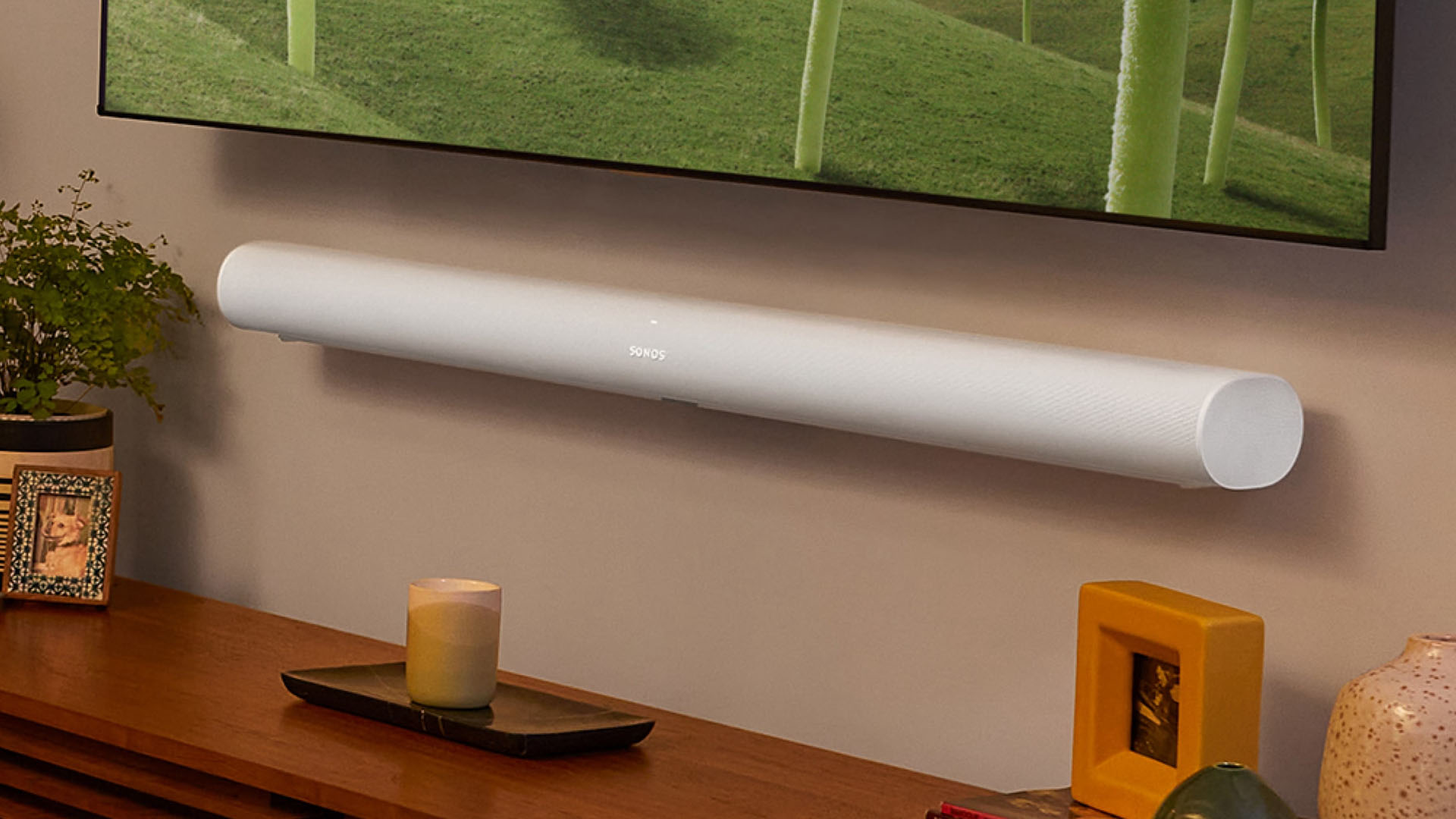 Sonos Arc soundbar mounted below a TV
