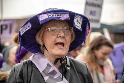 A Waspi protester is seen shouting slogans.