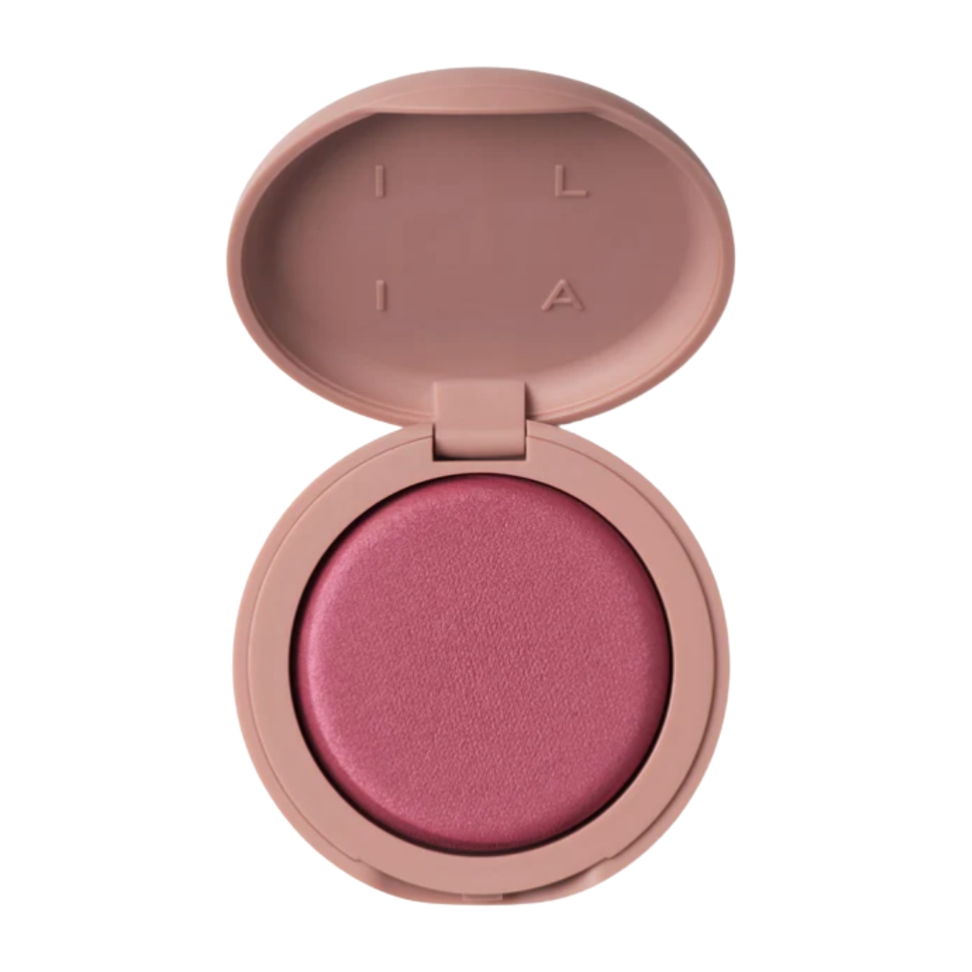 A product shot of the ILIA Soft Focus Blurring Blush, in warm pink-rose shade, on a white background