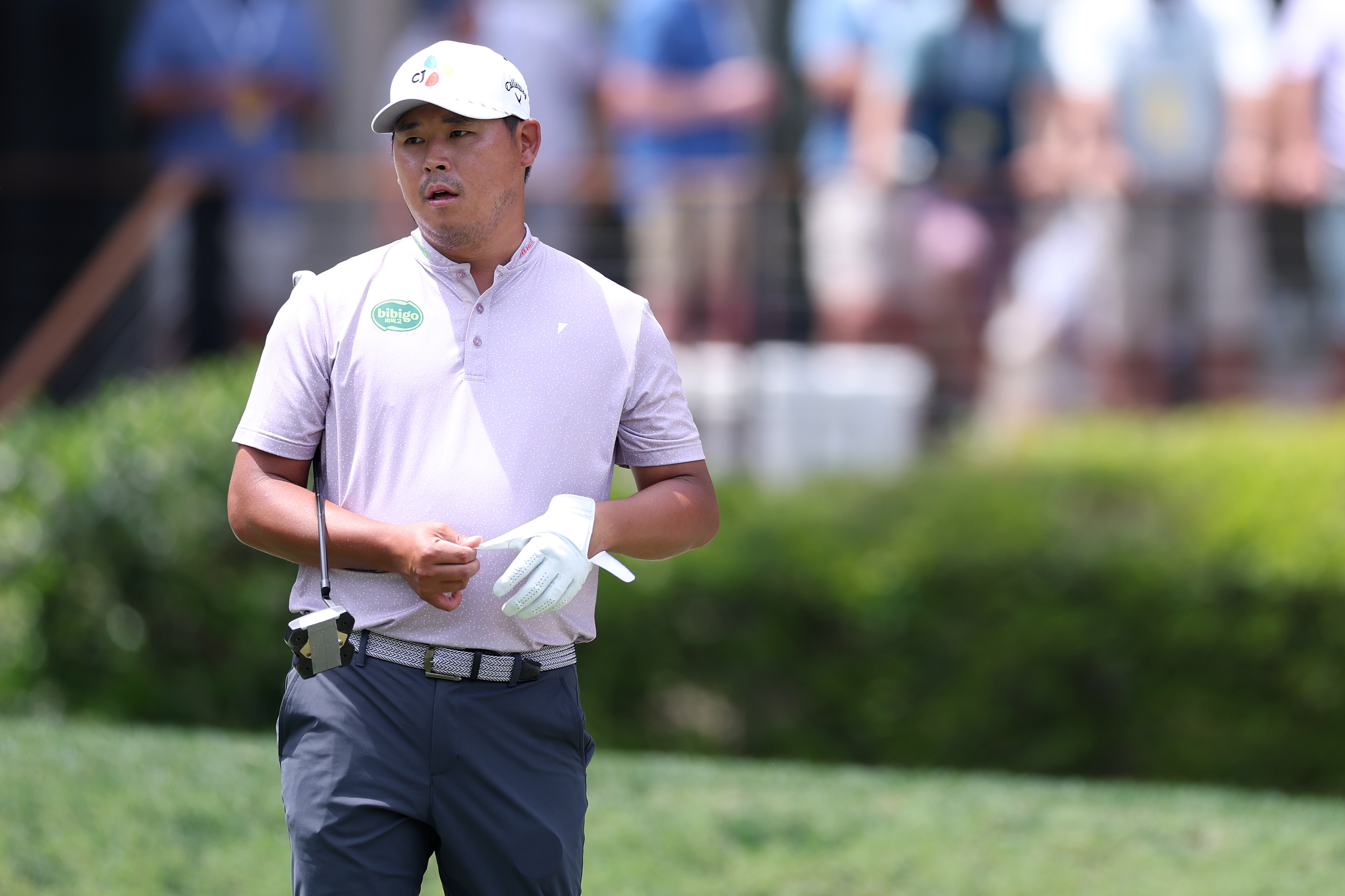 Si Woo Kim looks on from the third green during the third round of the RBC Heritage