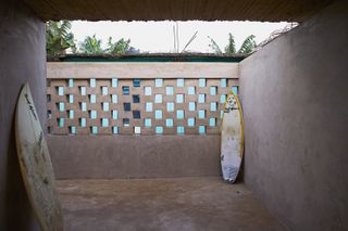 courtyard with perforated bricks at Surf Ghana Collective_by_Glenn DeRoché + Juergen Strohmayer