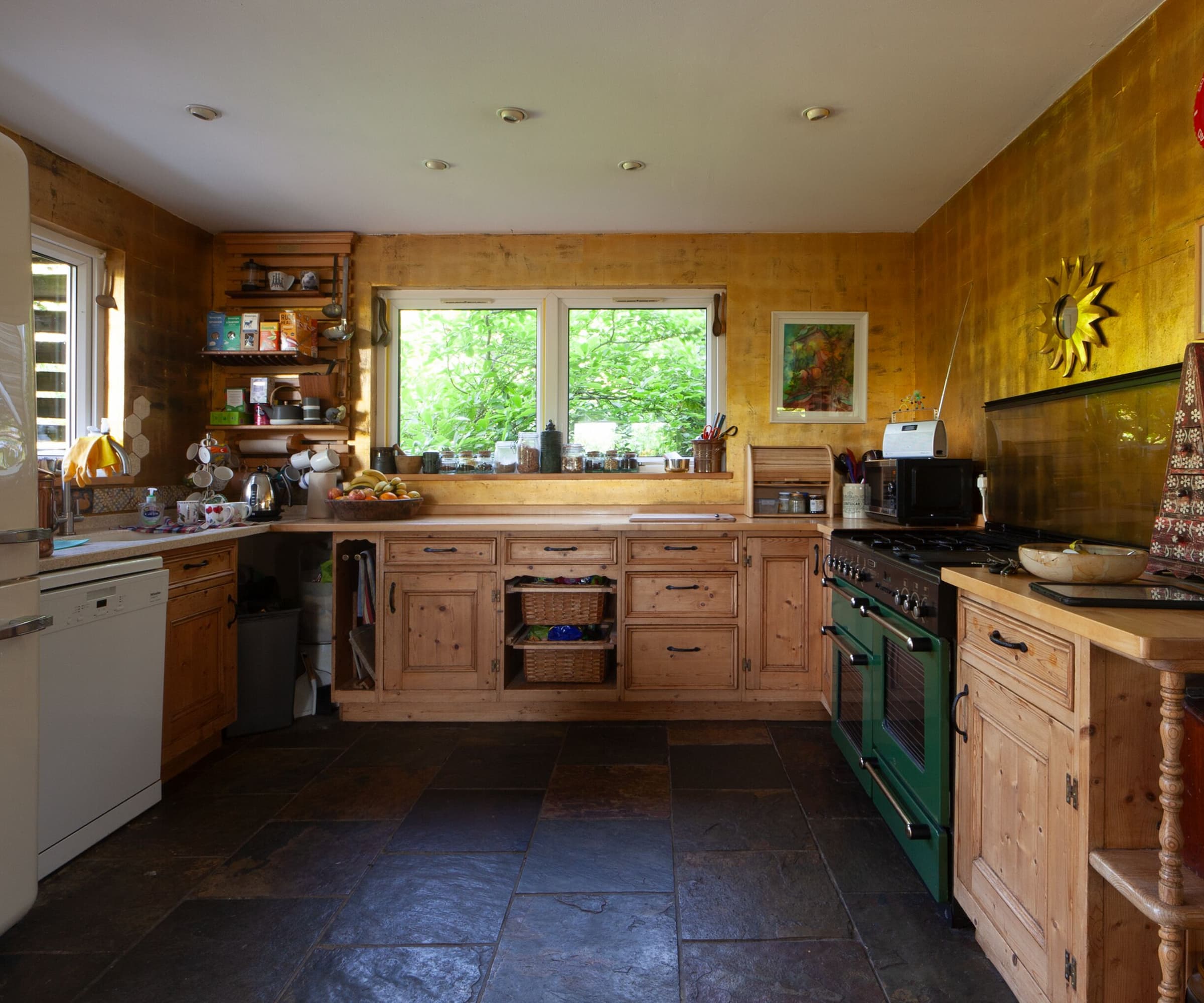 A kitchen with wooden cabinets