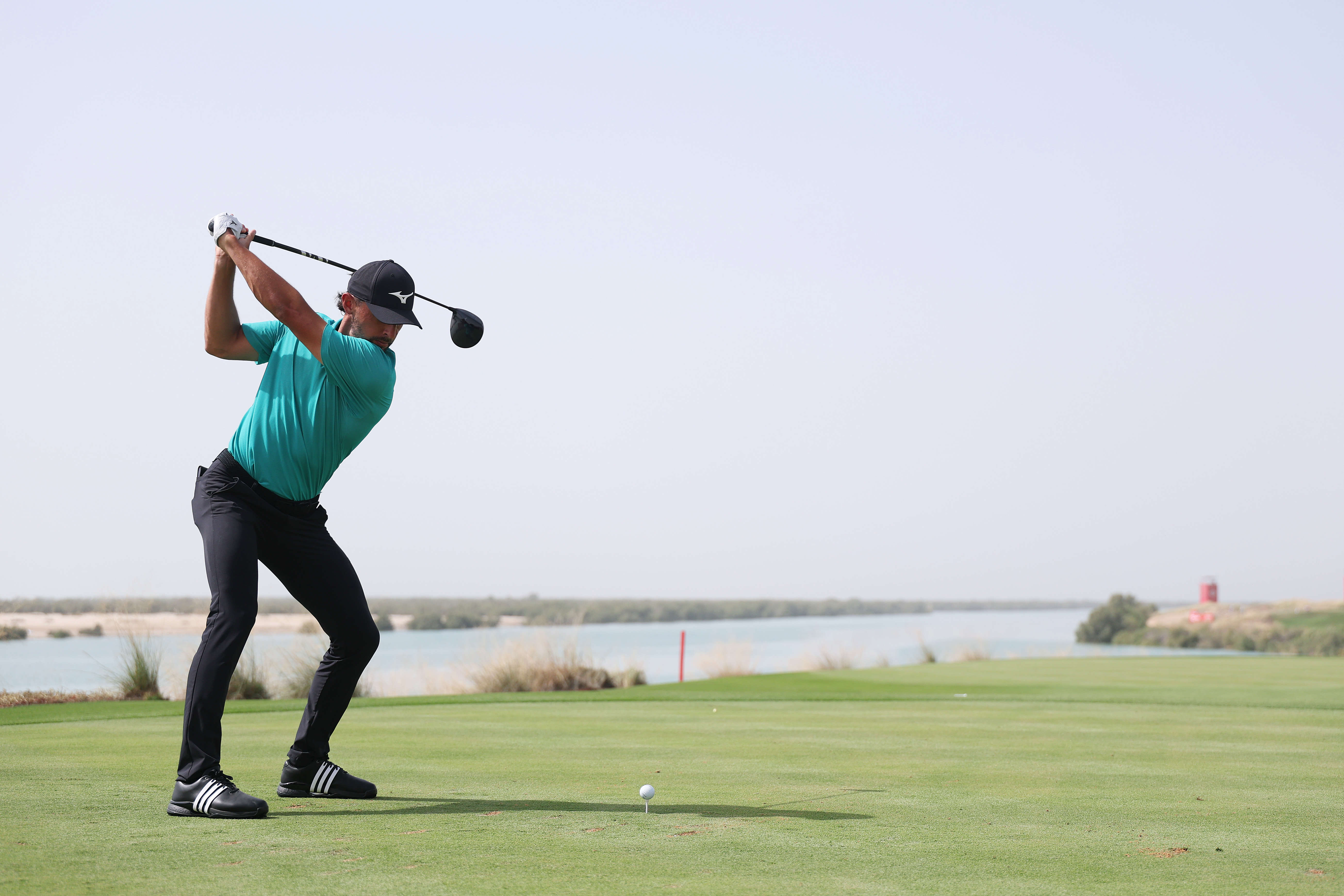 Marco Penge at the top of his backswing