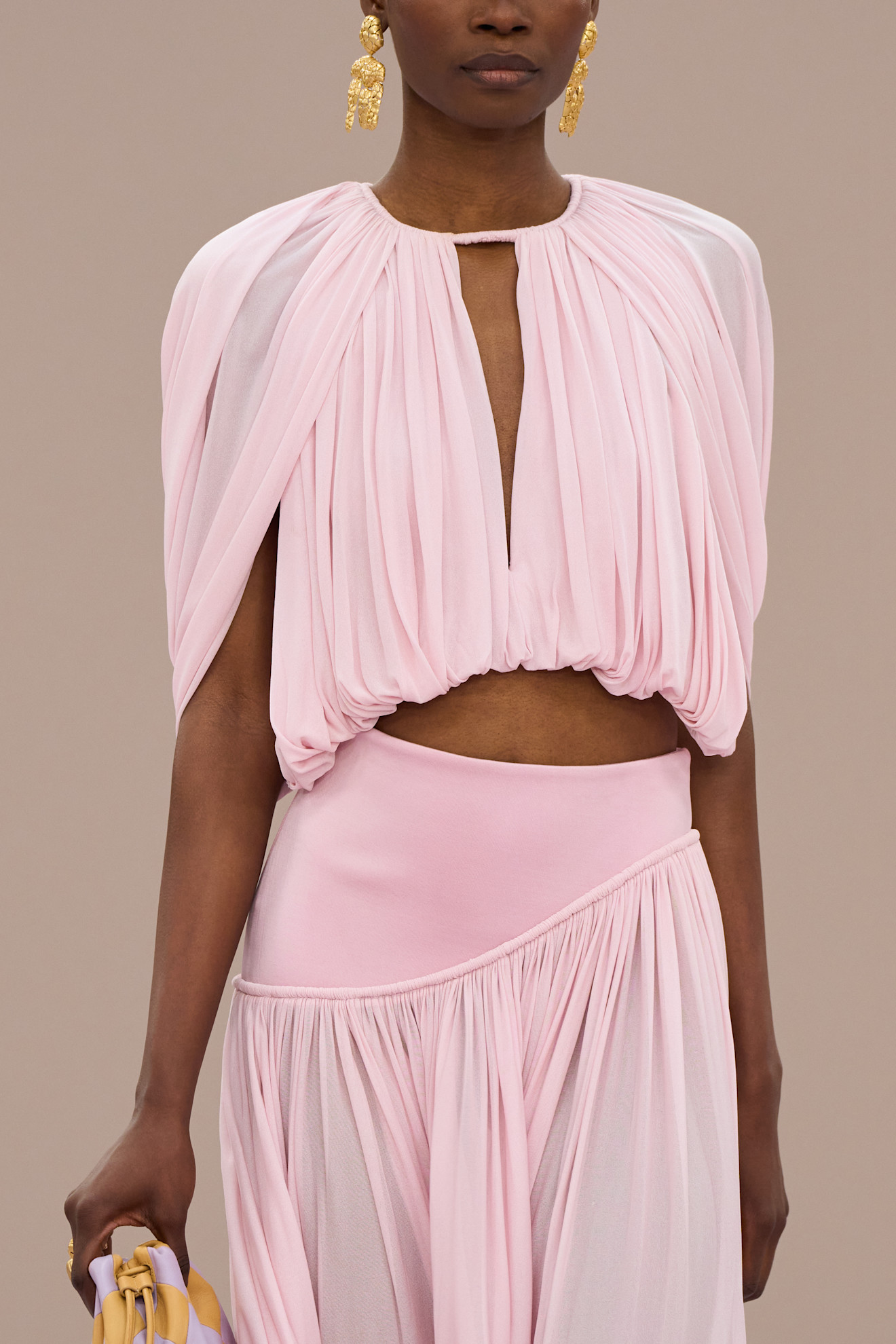 A model wore peony pink on the Zimmermann Spring 2026 runway
