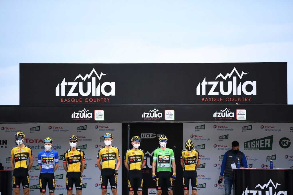 ONDARROA SPAIN APRIL 09 Start Primoz Roglic of Slovenia Green Points Jersey Jonas Vingegaard Rasmussen of Denmark Blue Best Young Rider Jersey Tobias Foss of Norway Christoph Pfingsten of Germany Lennard Hofstede of Netherlands Antwan Tolhoek of Netherlands Sam Oomen of Netherlands and Team Jumbo Visma during the 60th ItzuliaVuelta Ciclista Pais Vasco 2021 Stage 5 a 1602km stage from Hondarribia to Ondarroa Mask Covid Safety Measures itzulia ehitzulia on April 09 2021 in Ondarroa Spain Photo by David RamosGetty Images