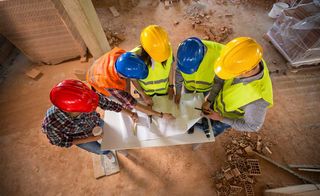 builders looking at plans