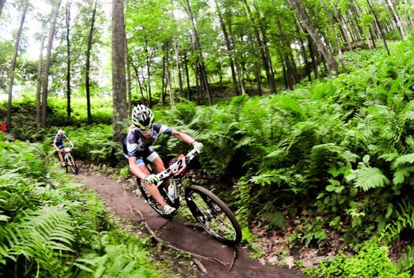Willow Koerber (Subaru-Trek) leading Georgia Gould (Luna) through Fern Valley.