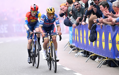 Mattias Skjelmose of Denmark and Team Lidl - Trek and Remco Evenepoel of Belgium and Team Soudal Quick-Step compete in the chase group during the 59th Amstel Gold Race 2025 