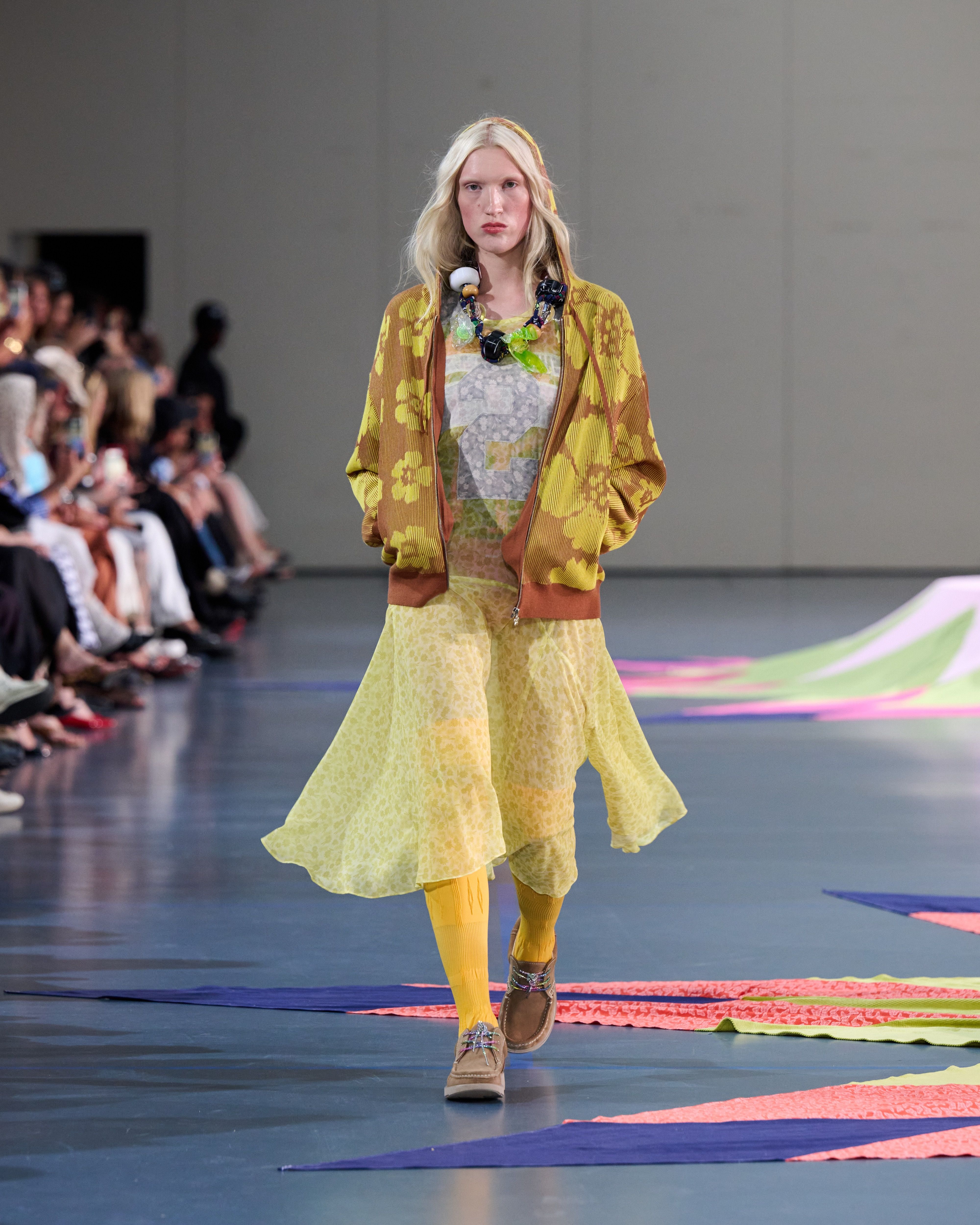 Spring 2027 Copenhagen Fashion Week looks featuring sheer layers, flowing silhouettes, and mixed prints from Anne Sofie Madsen, Institution, and Paolina Russo.