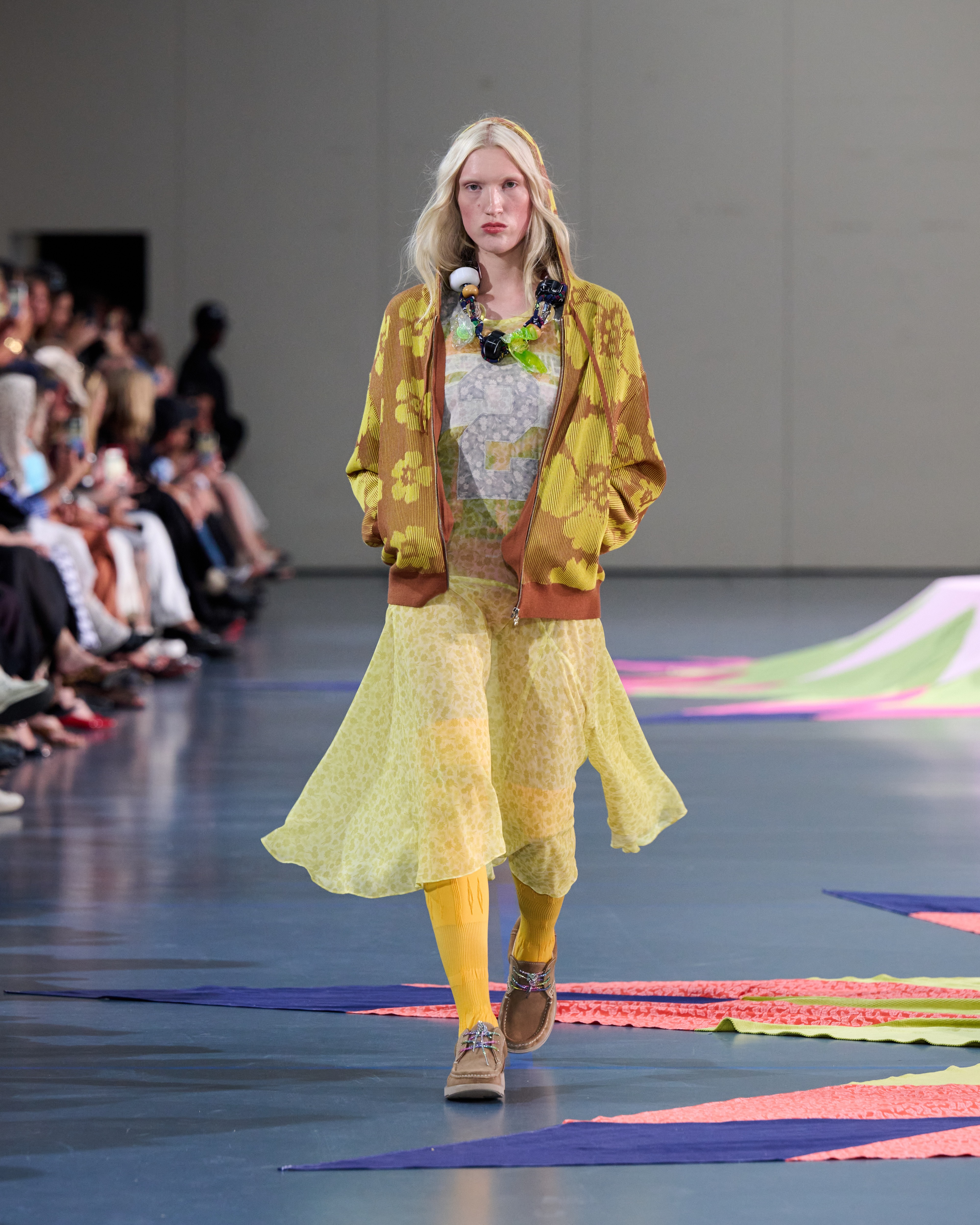 Spring 2027 Copenhagen Fashion Week looks featuring sheer layers, flowing silhouettes, and mixed prints from Anne Sofie Madsen, Institution, and Paolina Russo.