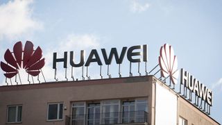 The Huawei logo atop an office building
