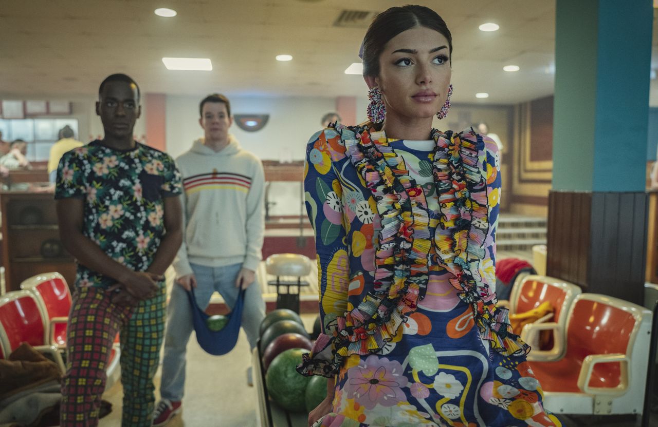 Mimi Keene as Ruby Matthews, Connor Swindells as Adam Groff, Ncuti Gatwa as Eric Effiong in Episode 3 of Sex Education Season 3