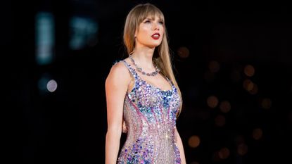 Taylor Swift performs onstage during The Eras Tour at Mercedes-Benz Stadium on April 28, 2023 in Atlanta, Georgi
