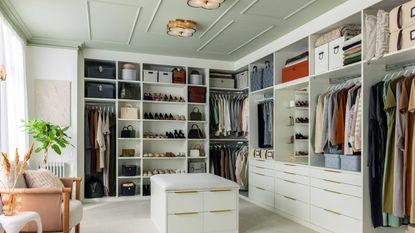 large closet with shelves, hanging space and storage baskets