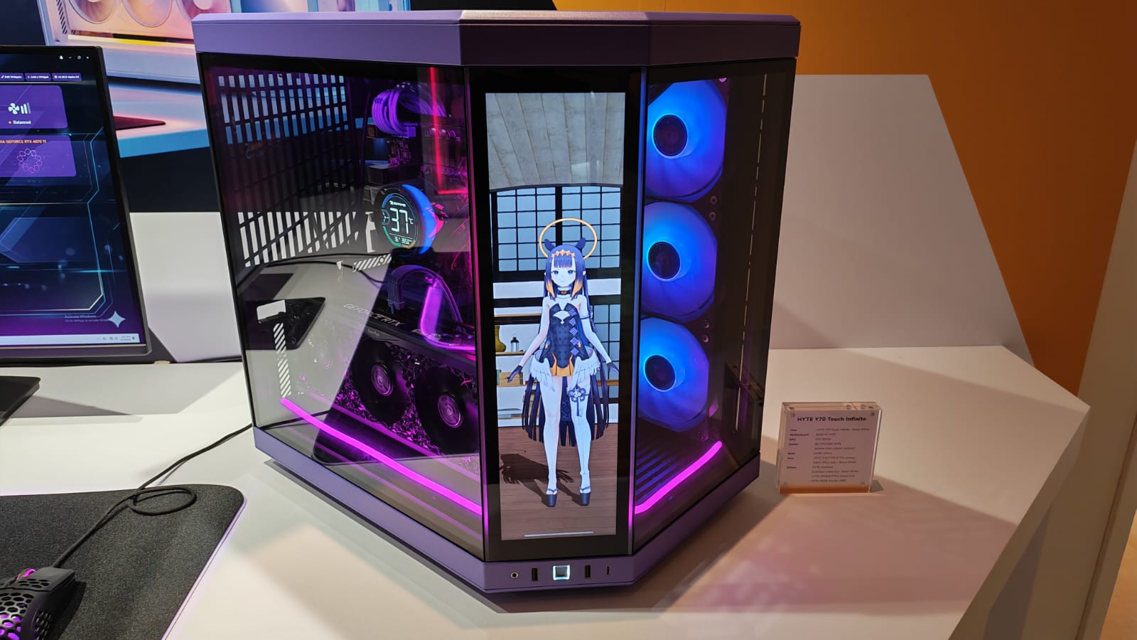 An HYTE Touch Infinite case showing an anime character on the interactive touchscreen