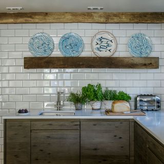 cornish dream home kitchen with white subway tiles and shelf