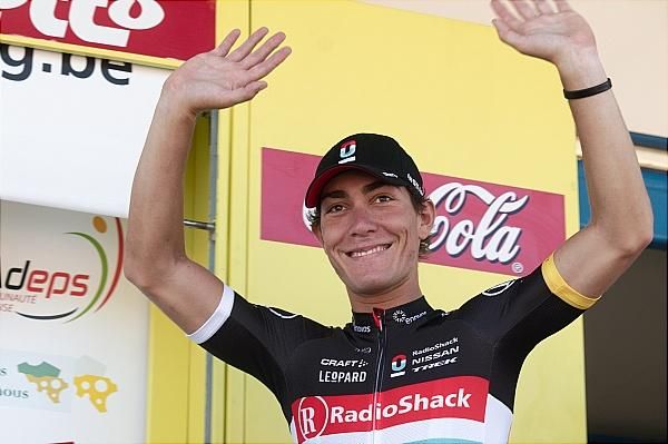 A beaming Giacomo Nizzolo (RadioShack-Nissan) heads to the podium after winning stage 3.