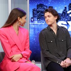 Tom Holland and Zendaya gaze at one another during a press call