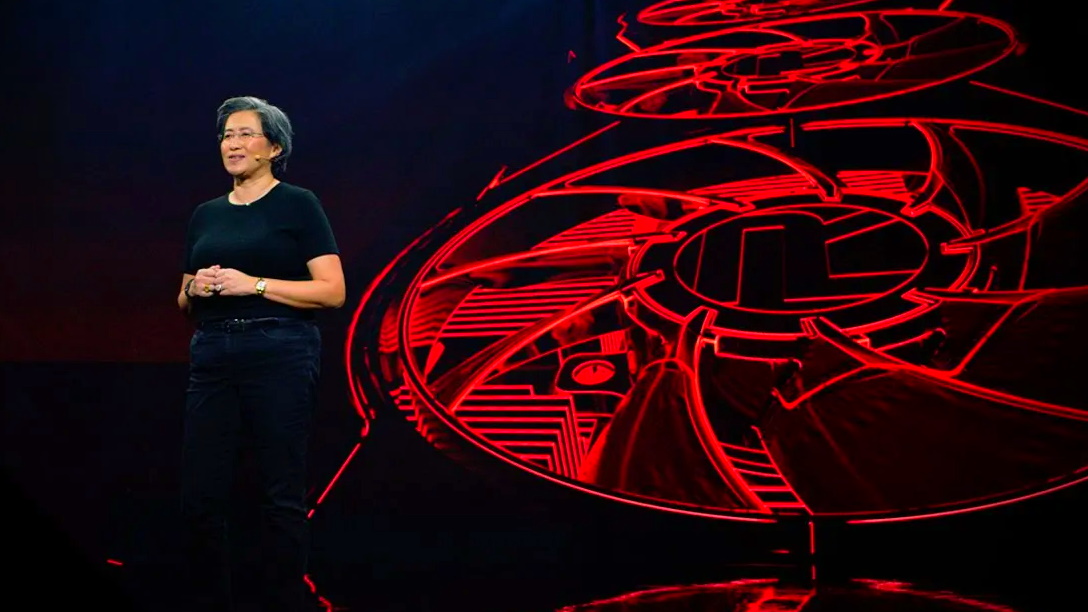 Lisa Su in front of GPU image