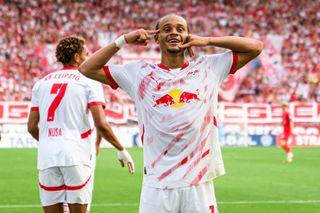 Xavi Simons of Leipzig celebrates after scoring his teams fourth goal during the DFB-Pokal match between Rot-Weiss Essen and RB Leipzig at on August 17, 2024 in Essen, Germany.