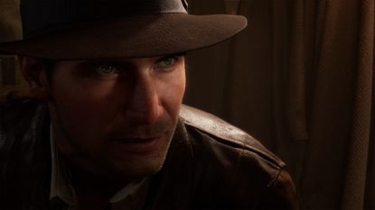 Indiana Jones and The Great Circle - Indiana peers out from the shadows in stealth
