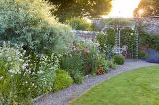 Cottage garden border and arbor