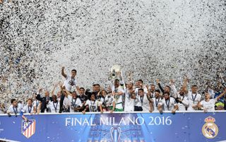 Real Madrid players celebrate their Champions League final win over Atletico Madrid at Milan's San Siro in May 2016.