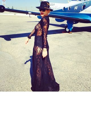 Rita Ora Poses In Front Of Her Jet Before Coachella 2014