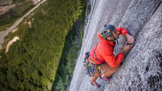 what is trad climbing: climber on rock wall