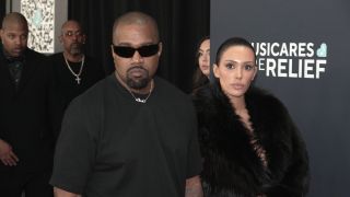 LOS ANGELES, CALIFORNIA - FEBRUARY 02: (FOR EDITORIAL USE ONLY) (L-R) Kanye West and Bianca Censori attend the 67th GRAMMY Awards at Crypto.com Arena on February 02, 2025 in Los Angeles, California.