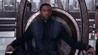 Chadwick Boseman's T'Challa sitting in Wakandan throne room in Black Panther