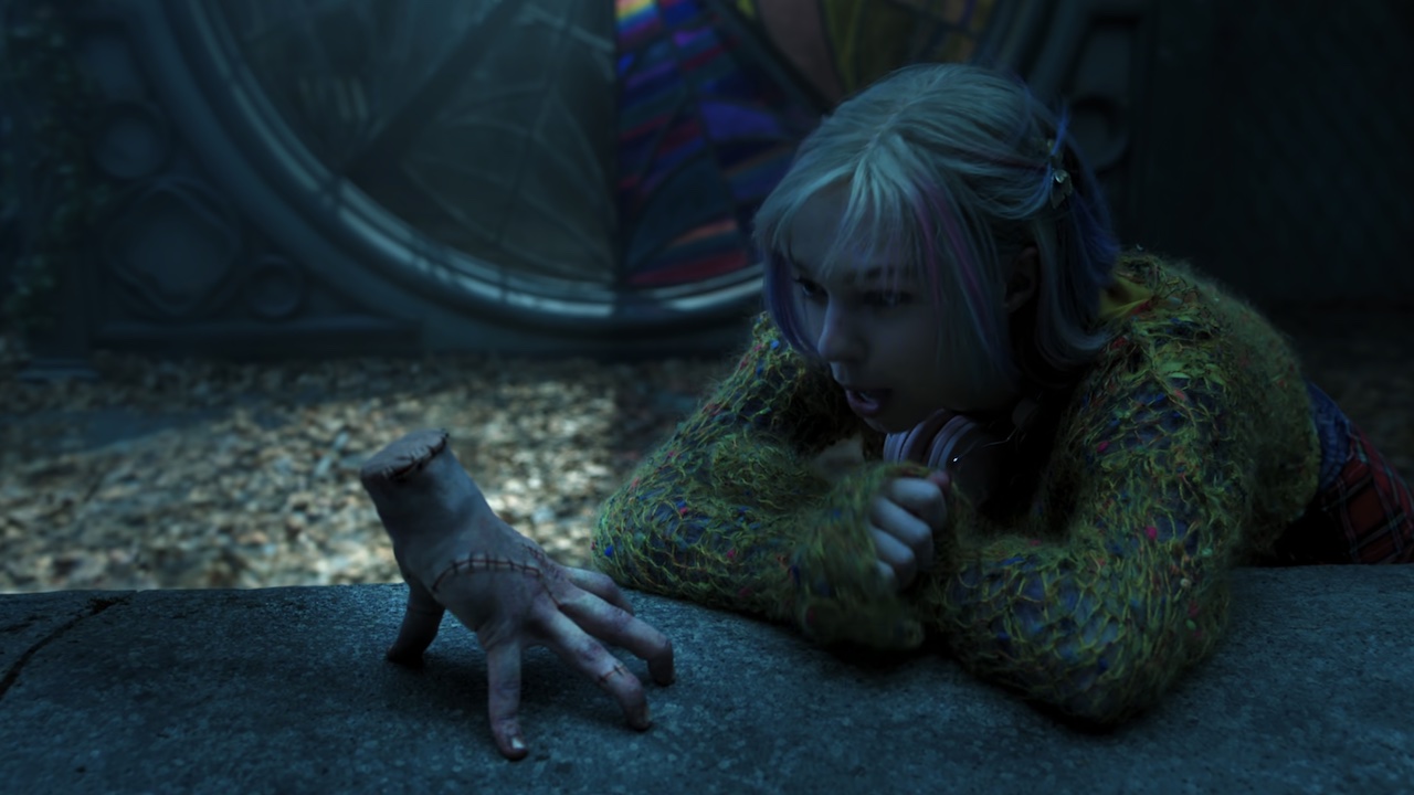 Thing and Astrid talking in Wednesday Season 2