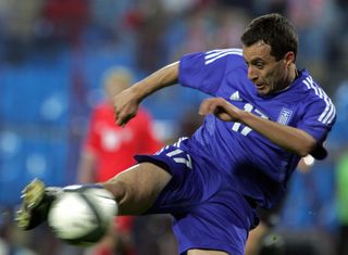 Georgios Georgiadis scores for Greece against Poland in May 2004.