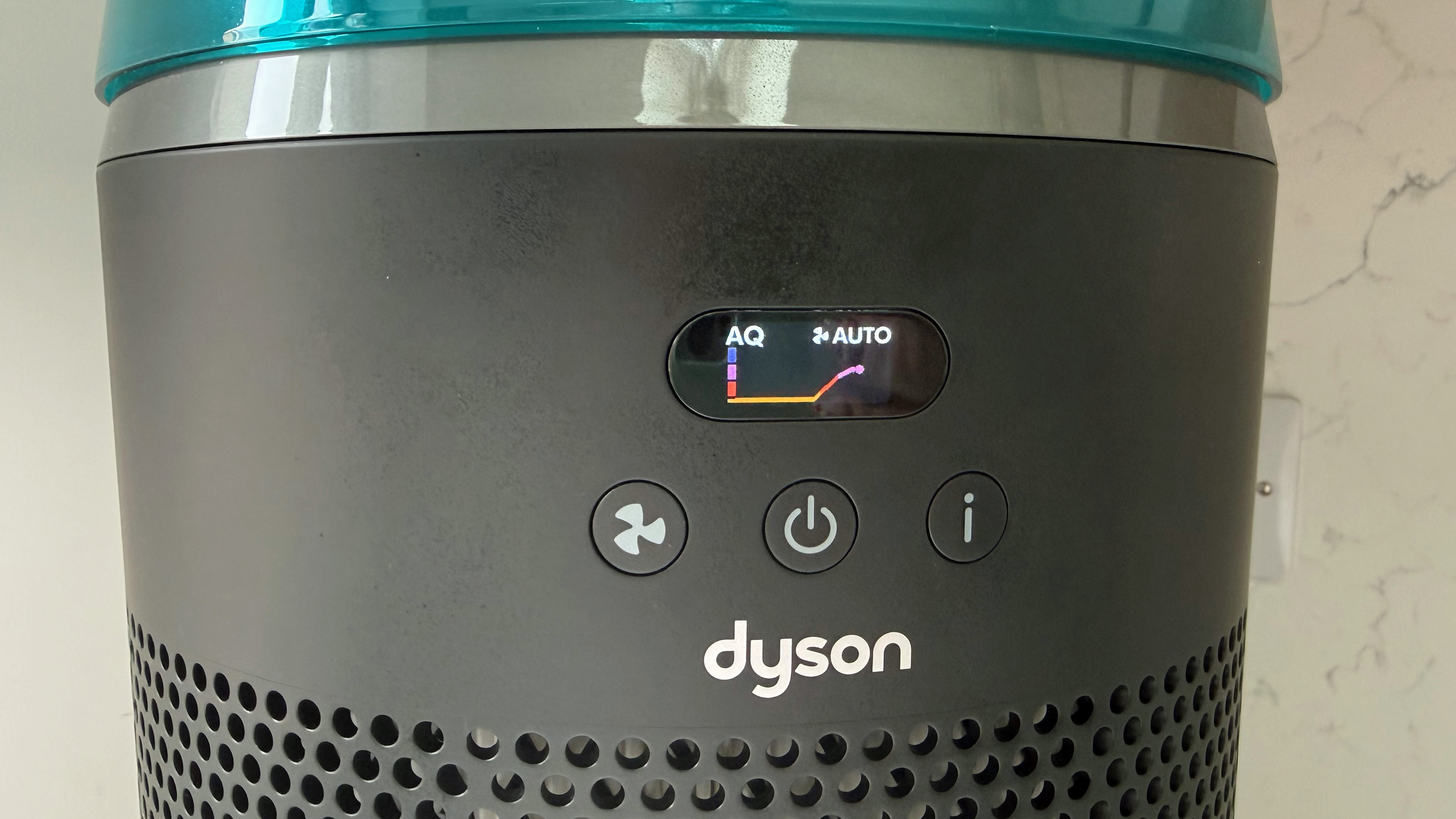 Close-up of the Dyson HushJet display showing air quality levels and auto mode status with colored particulate indicators