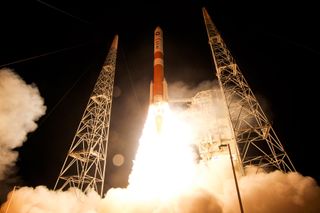 A United Launch Alliance Delta 4 rocket carrying the fifth Wideband Global SATCOM (WGS-5) satellite launches from Space Launch Complex-37 at Cape Canaveral Air Force Station in Florida on May 24, 2013.
