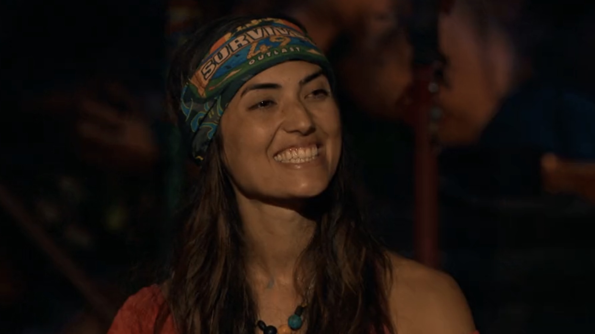 Savannah smiling after getting her first vote in Survivor 49's Final Tribal Council.