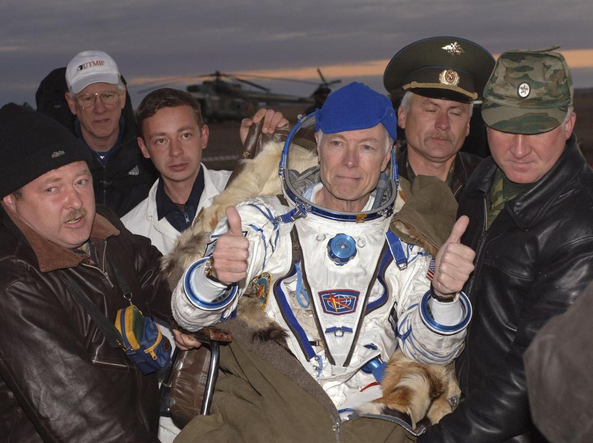 Space tourist Greg Olsen gives two thumb&#039;s up after returning to Earth from the International Space Station on a Soyuz spacecraft in October 2005. He returned home with the Expedition 11 crew.