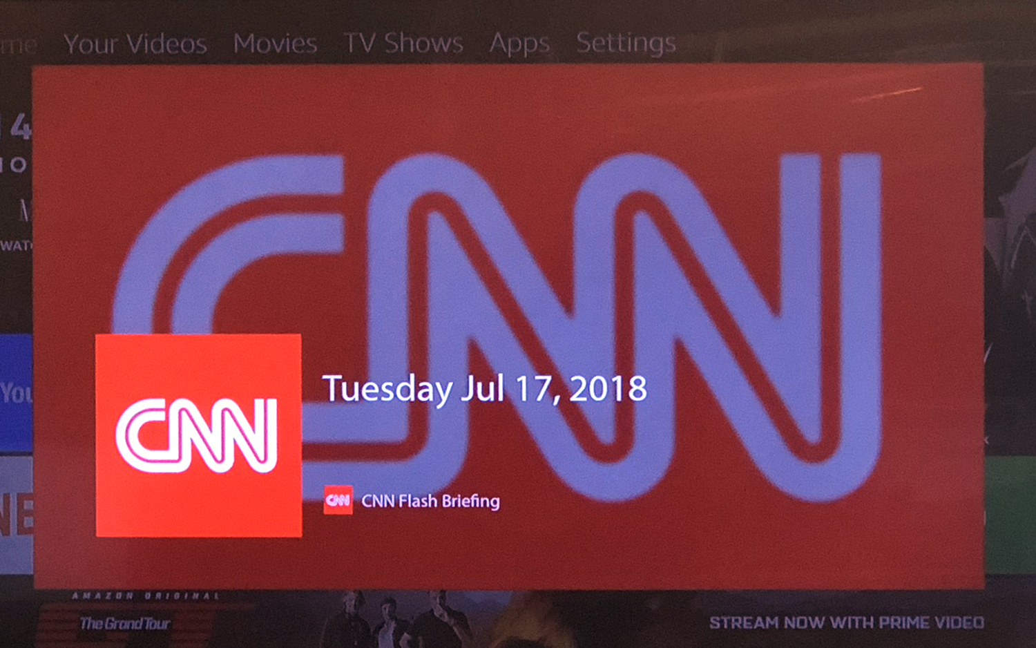 The Fire TV Stick interface with a CNN flash briefing