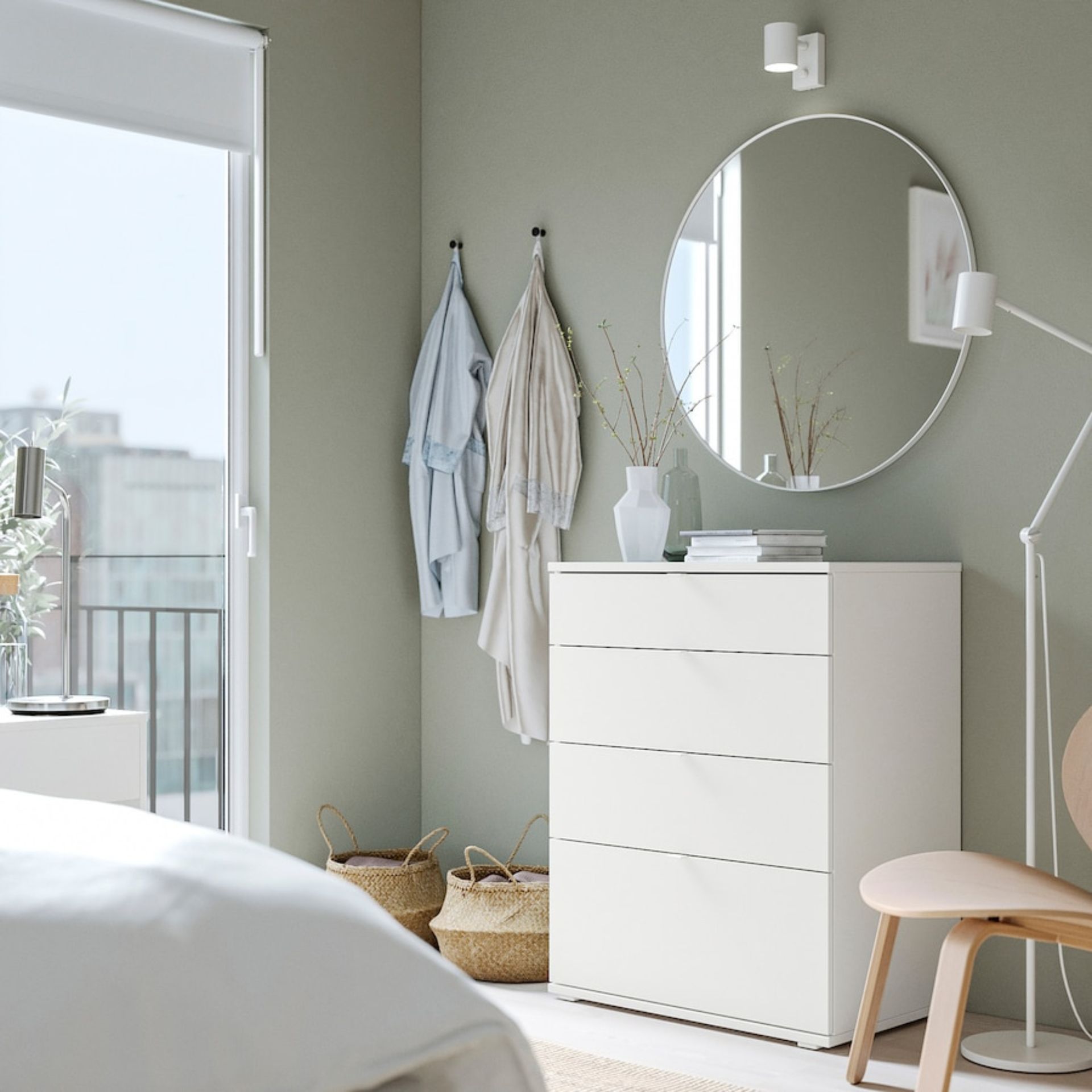 White chest of drawers in bedroom