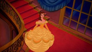 Belle coming down the stairs with her iconic yellow dress in Beauty and the Beast